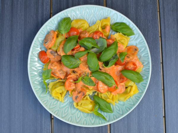 Creamy tomato pasta with mushrooms and feta cheese Creamy tomato pasta with mushrooms and feta cheese