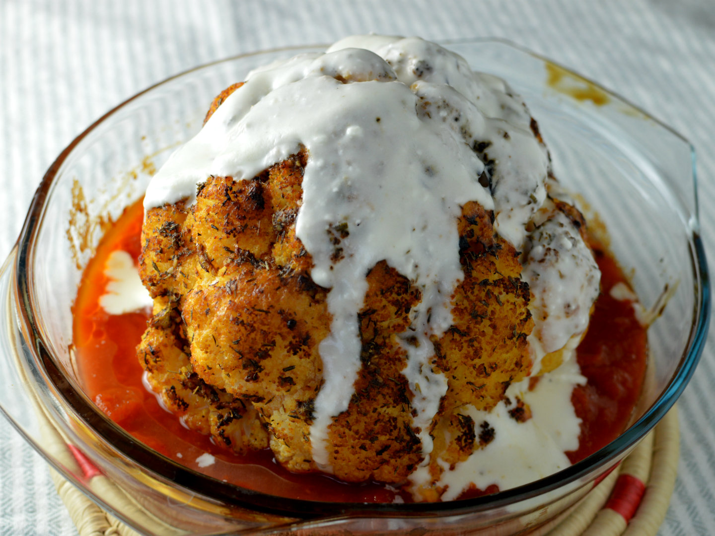 whole roasted cauliflower with feta cheese sauce