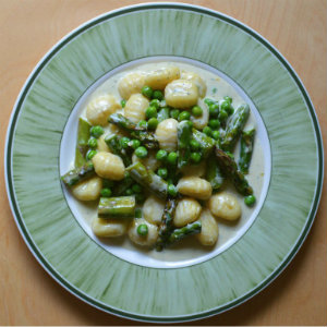 Creamy blue cheese gnocchi with asparagus and peas